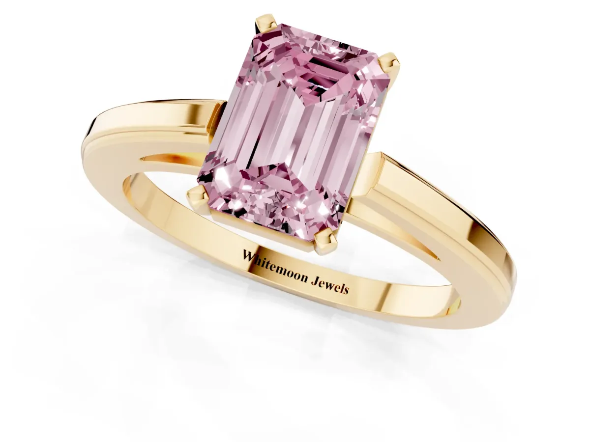 Fancy Pink Emerald Cut Solitaire Diamond Ring with Four-Prong Setting and Classic Band Yellow gold