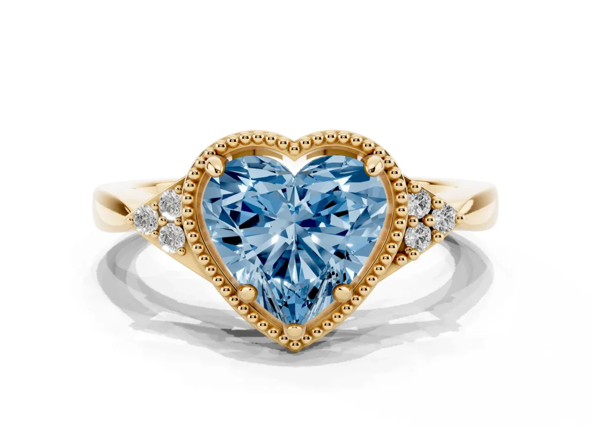 Fancy Blue Milgrain Heart Cut Cut Diamond Ring with Tapered Pave Band and Four Prong Setting Yellow gold
