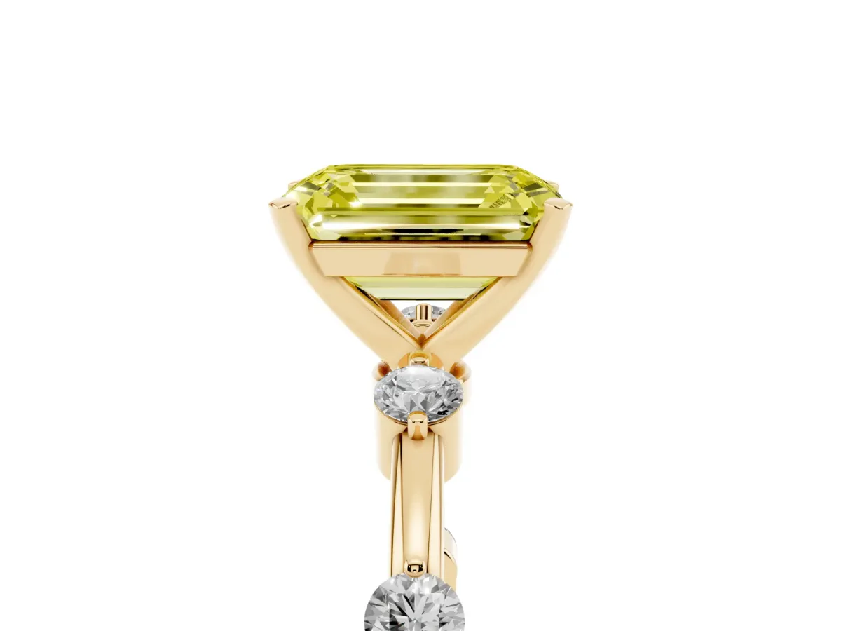 Fancy Yellow Emerald Cut Solitaire Diamond Ring with Bezel Set Side Stones and Prong Setting Yellow gold