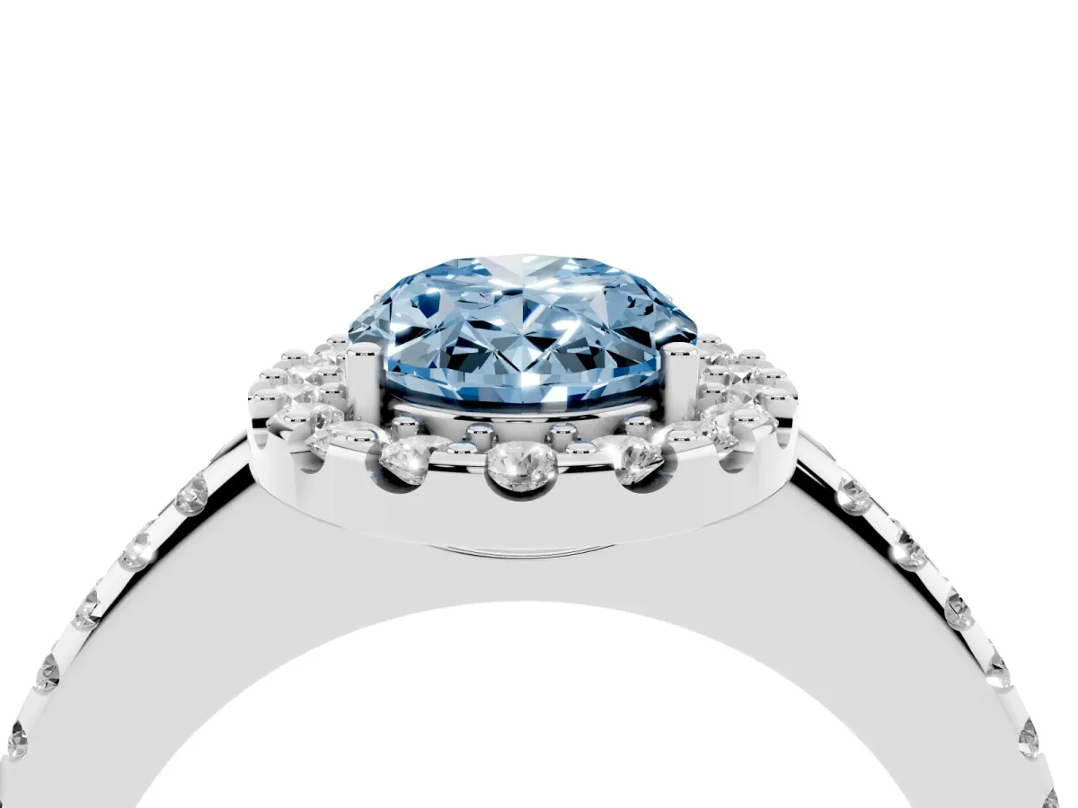 Fancy Blue Oval Cut Diamond Pavé Halo Ring with Four-Prong Setting Silver