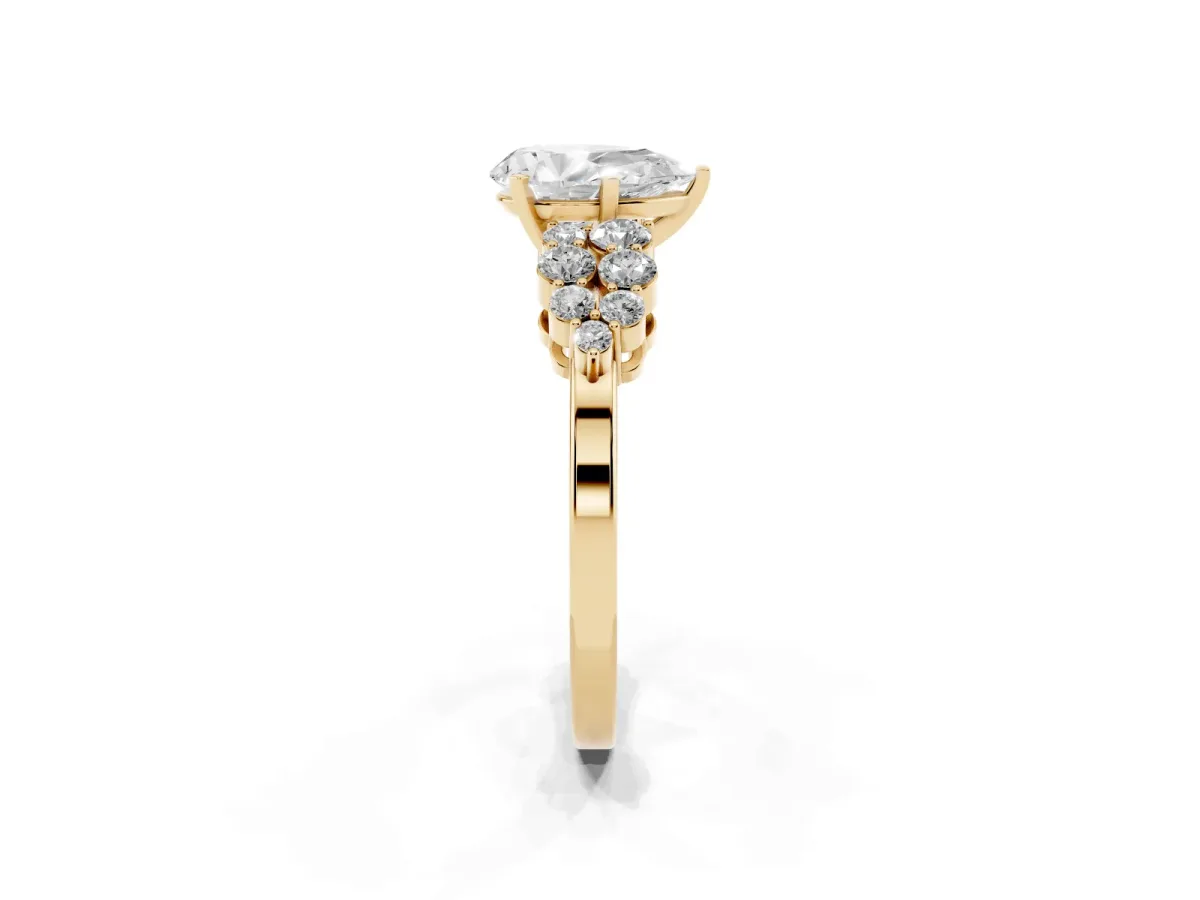 Pear Cut Cluster Diamond Engagement Ring with Pavé Band and Four-Prong Setting Yellow gold