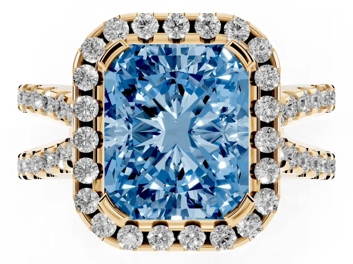 Fancy Blue Radiant Cut Diamond Halo Ring with Split Shank Pavé Band and Prong Setting Yellow gold