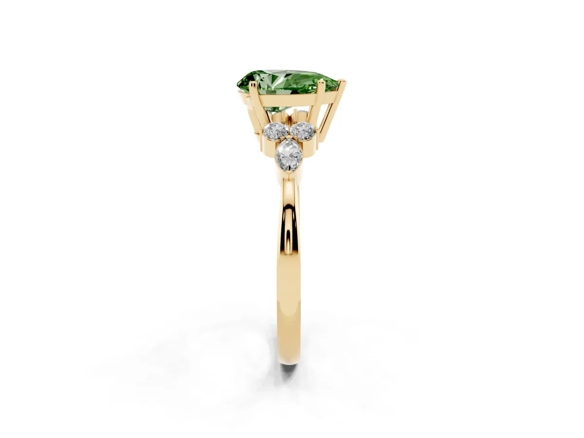 Fancy Green Pear Cut Brilliant Diamond Solitaire Ring with Pear Side Stones and Four-Prong Setting Yellow gold