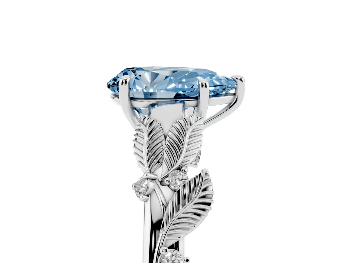 Fancy Blue Pear Cut Diamond Solitaire Ring with Leaf Motif Band and Four-Prong Setting Silver