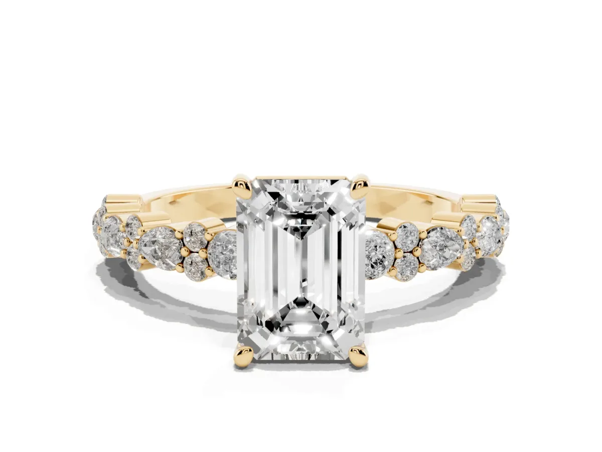 Emerald Cut Diamond Side Stone Solitaire Ring with Round and Four-Prong Setting Yellow gold