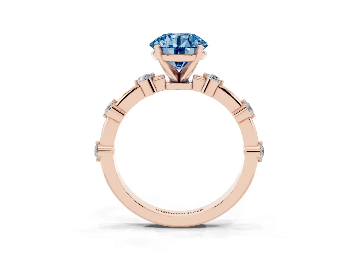 Fancy Blue Round Cut Solitaire Diamond Ring with Bezel Set Side Stones and Prong Setting Rose gold