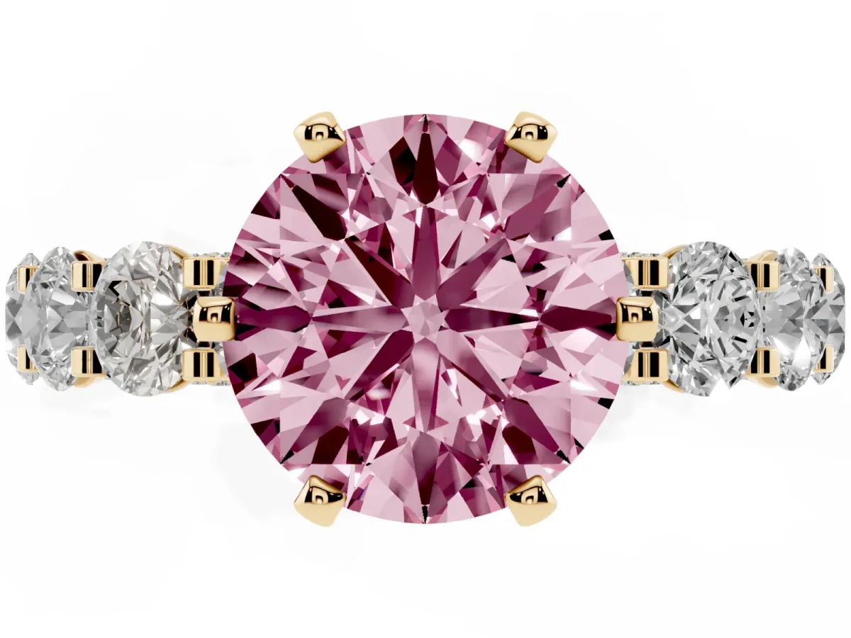 Fancy Pink Round Cut Diamond Side Stone Engagement Ring with Four-Prong Setting Yellow gold
