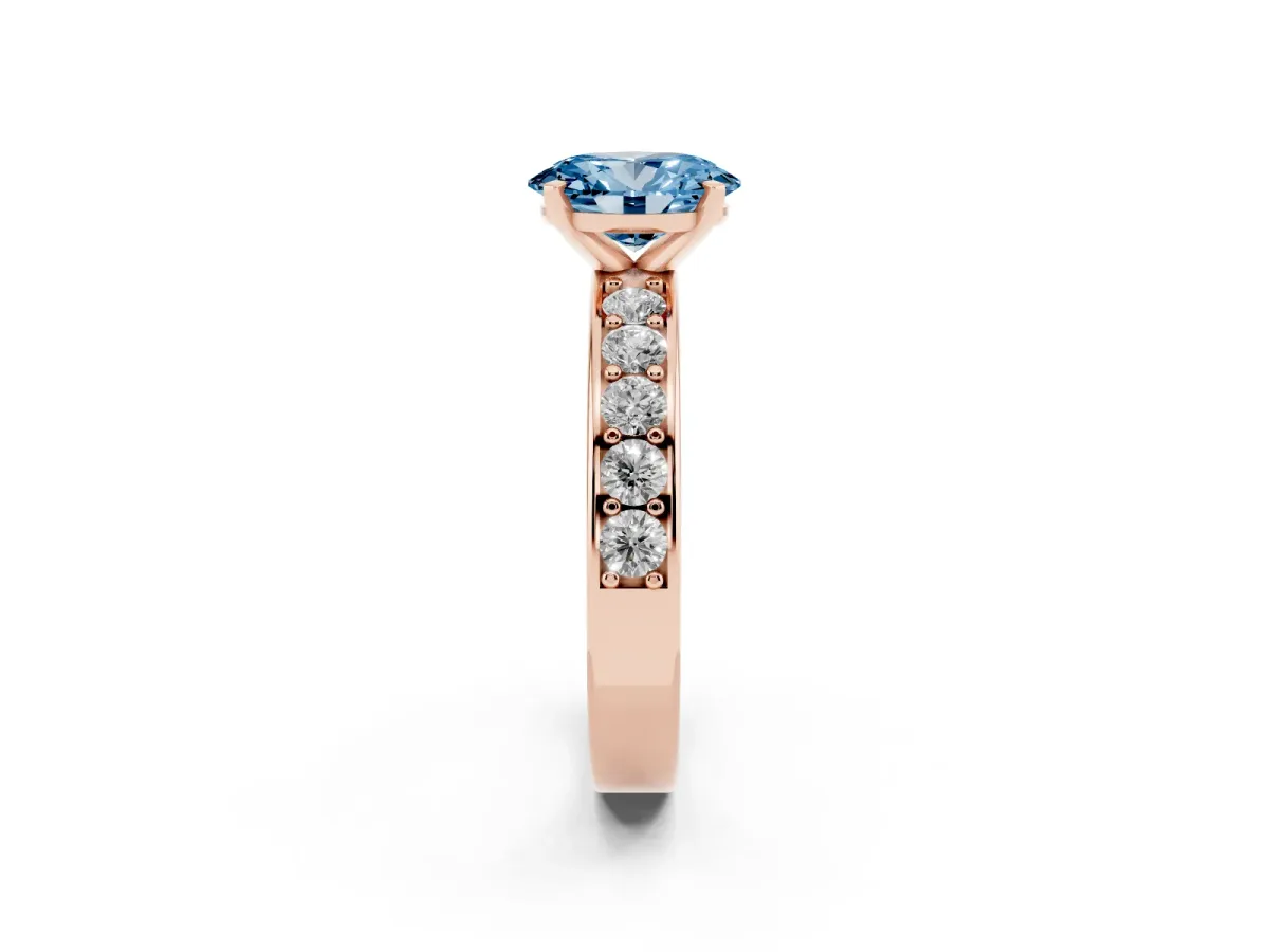 Fancy Blue Oval Cut Diamond Engagement Ring with Channel Set Round Band and Prong Setting Rose gold