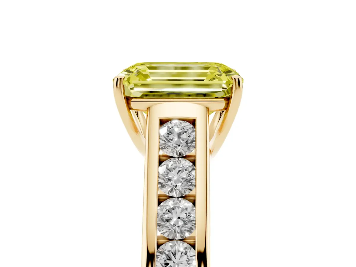 Fancy Yellow Emerald Cut Brilliant Channel-Set Solitaire Ring with Four-Prong Setting Yellow gold