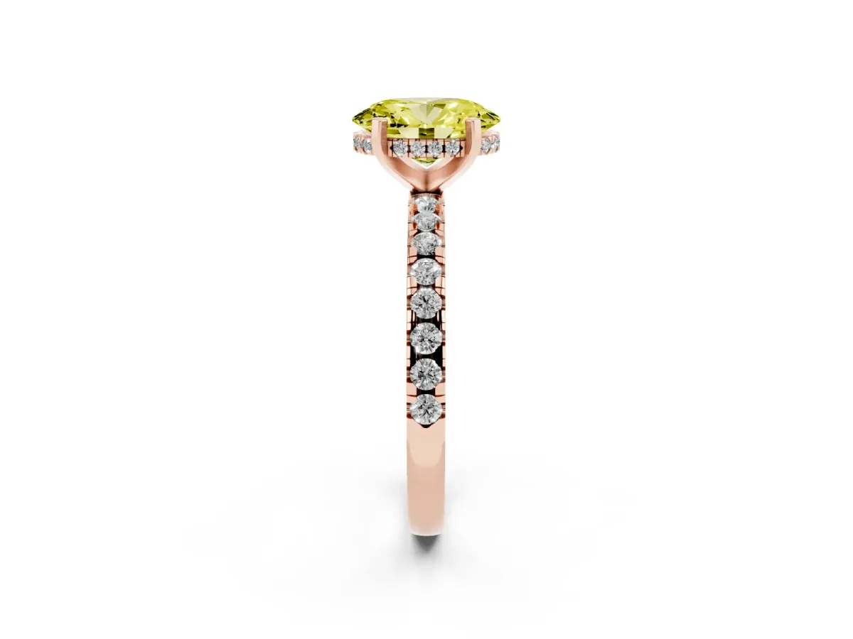 Fancy Yellow Oval Cut Diamond Solitaire Ring with Round Pavé Band and Four-Prong Setting Rose gold