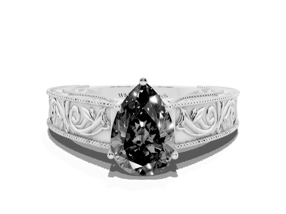 Fancy Black Pear Cut Diamond Solitaire Ring with Engraved Band and Four-Prong Setting Platinum