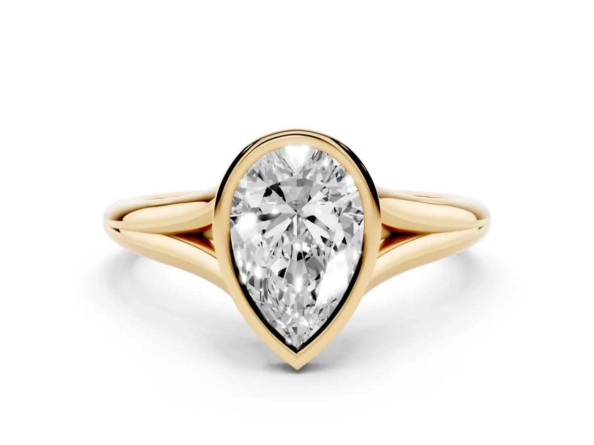 Bezel Set Pear Cut Cut Solitaire Ring with Tapered Band Yellow gold