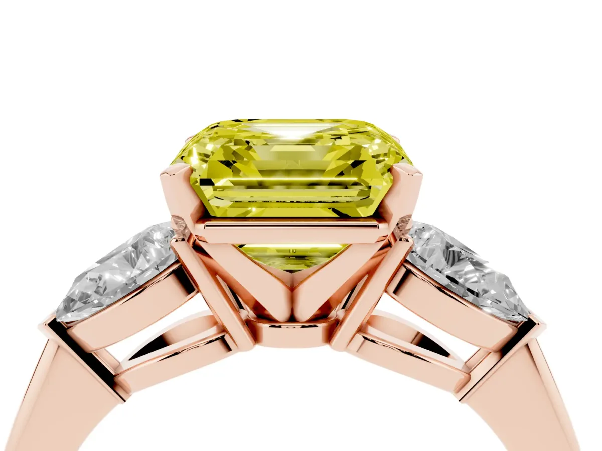 Fancy Yellow Three-Stone Asscher Cut Diamond Ring with Pear Side Stones and Four-Prong Setting Rose gold
