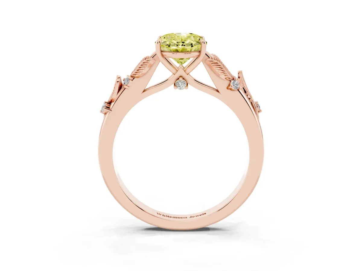 Fancy Yellow Oval Cut Diamond Solitaire Ring with Leaf Motif Band and Four-Prong Setting Rose gold