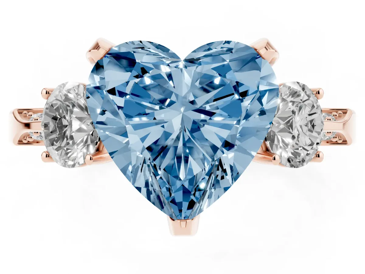 Fancy Blue Heart Cut Brilliant Three-Stone Diamond Ring with Pavé Band and Four-Prong Setting Rose gold