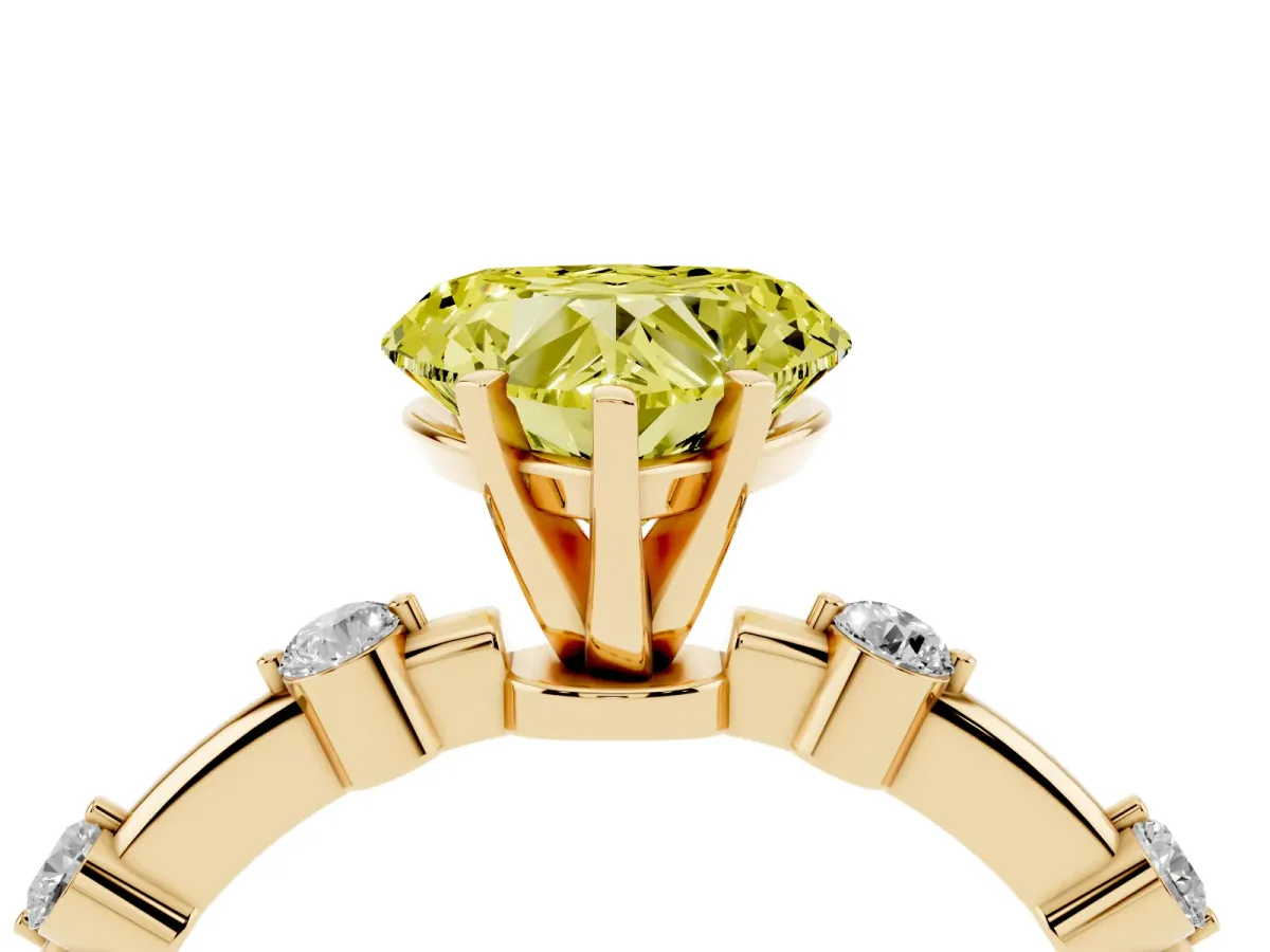 Fancy Yellow Heart Cut Solitaire Diamond Ring with Bezel Set Side Stones and Prong Setting Yellow gold