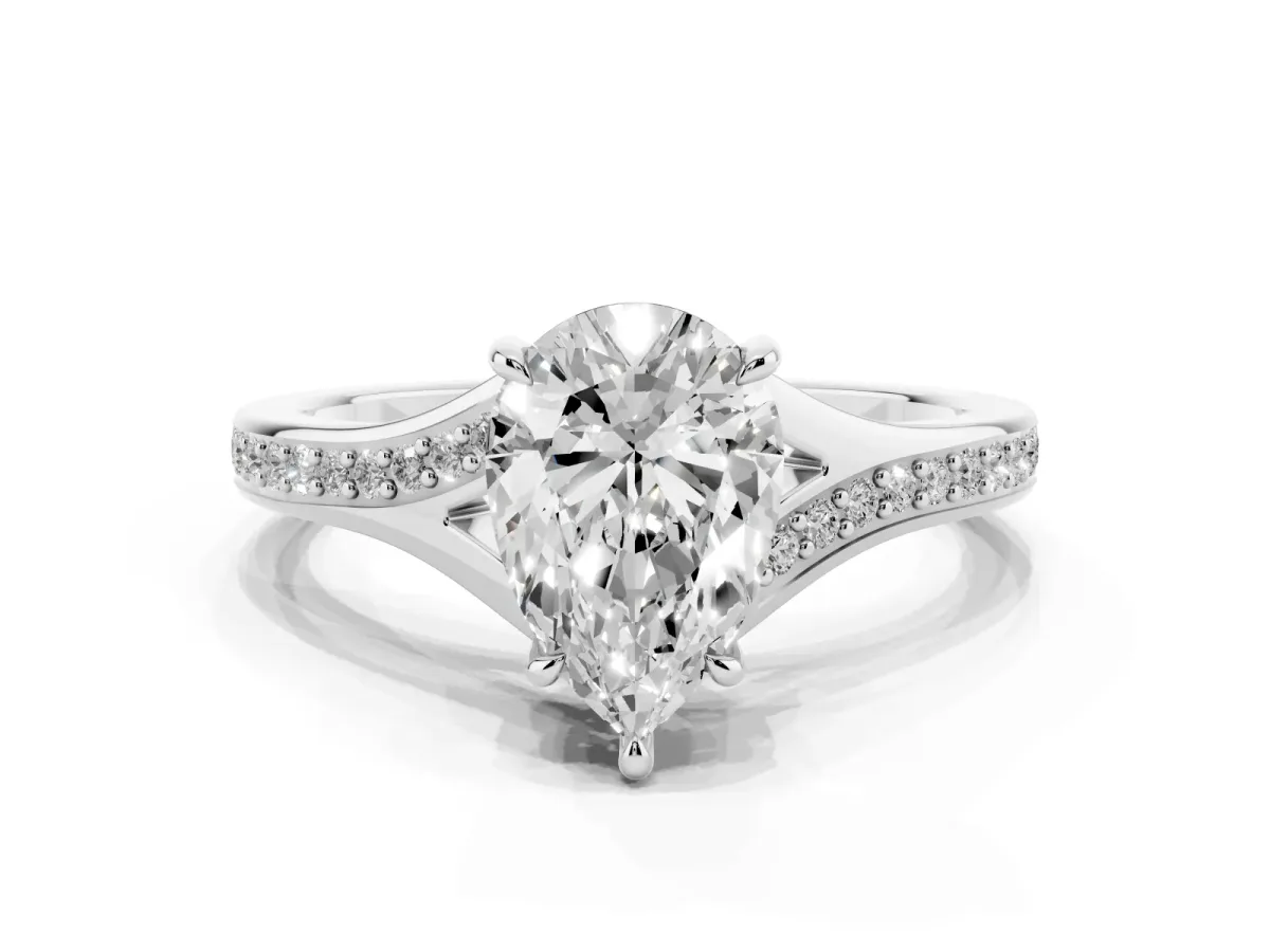Pear Cut Diamond Solitaire Ring with Pavé Band and Prong Setting Silver