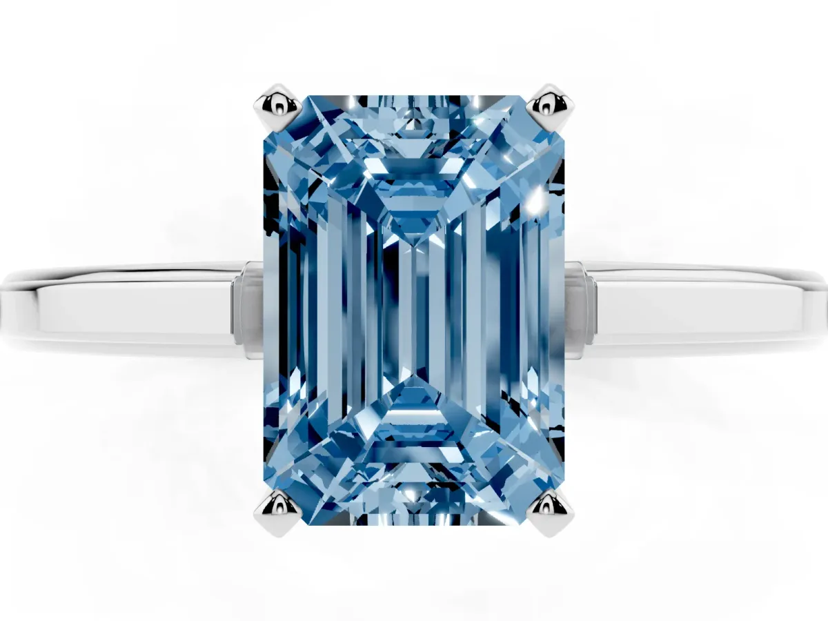 Fancy Blue Emerald Cut Solitaire Diamond Ring with Four-Prong Setting and Classic Band Platinum