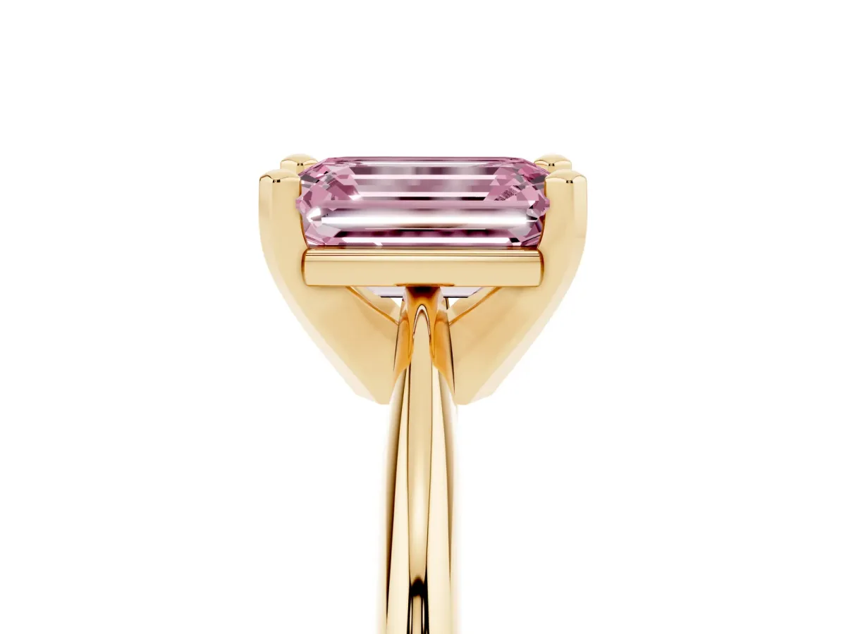 Fancy Pink Emerald Cut Cut Solitaire Ring with Four-Prong Setting on a Classic Band Yellow gold