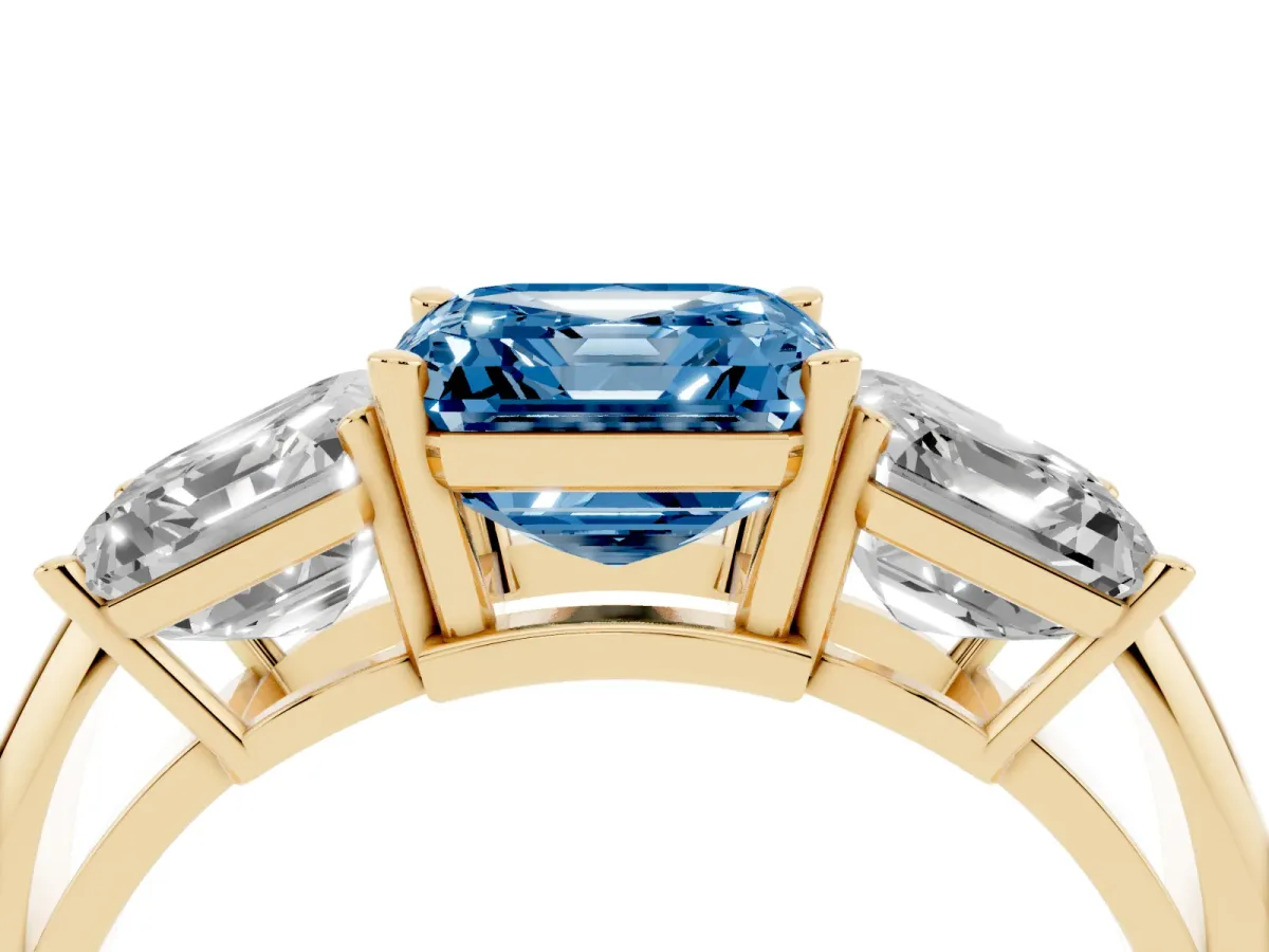 Fancy Blue Three-Stone Asscher Cut Cut Diamond Engagement Ring with Prong Setting on a White Gold Band Yellow gold
