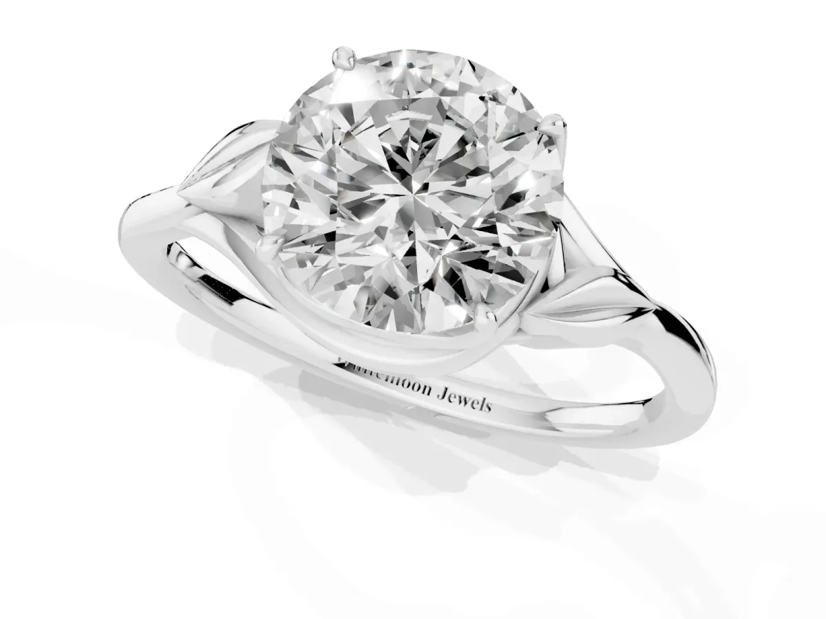 Round Cut Diamond Solitaire Ring with Twist Band and Four-Prong Setting Silver