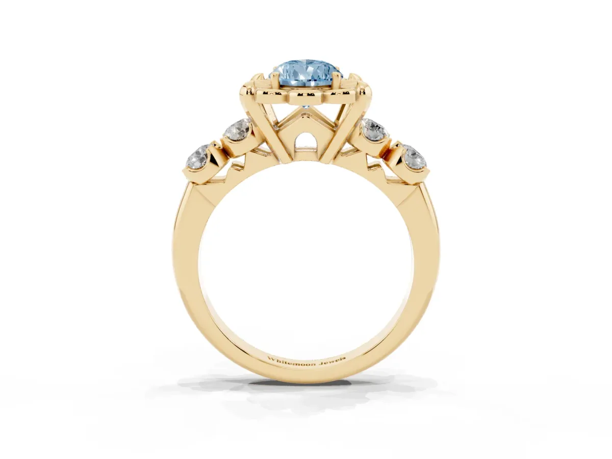 Fancy Blue Pear Cut Cut Diamond Floral Halo Engagement Ring with Shared Prong Setting Yellow gold