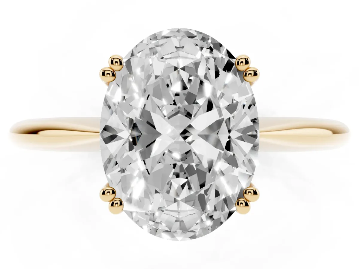 Oval Cut Solitaire Diamond Ring with Six-Prong Setting and Classic Band Yellow gold