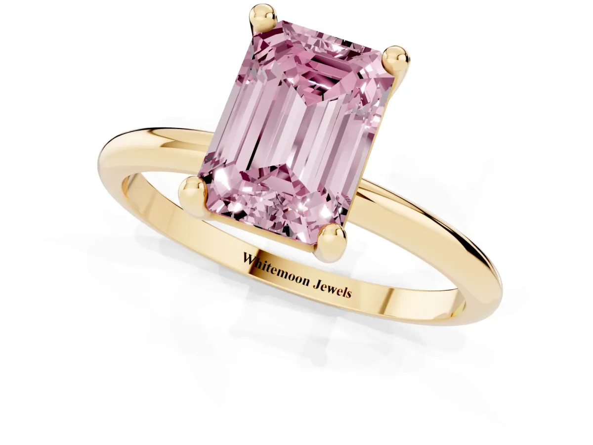 Fancy Pink Emerald Cut Solitaire Diamond Ring with 4-Prong Setting on a Classic Band Yellow gold