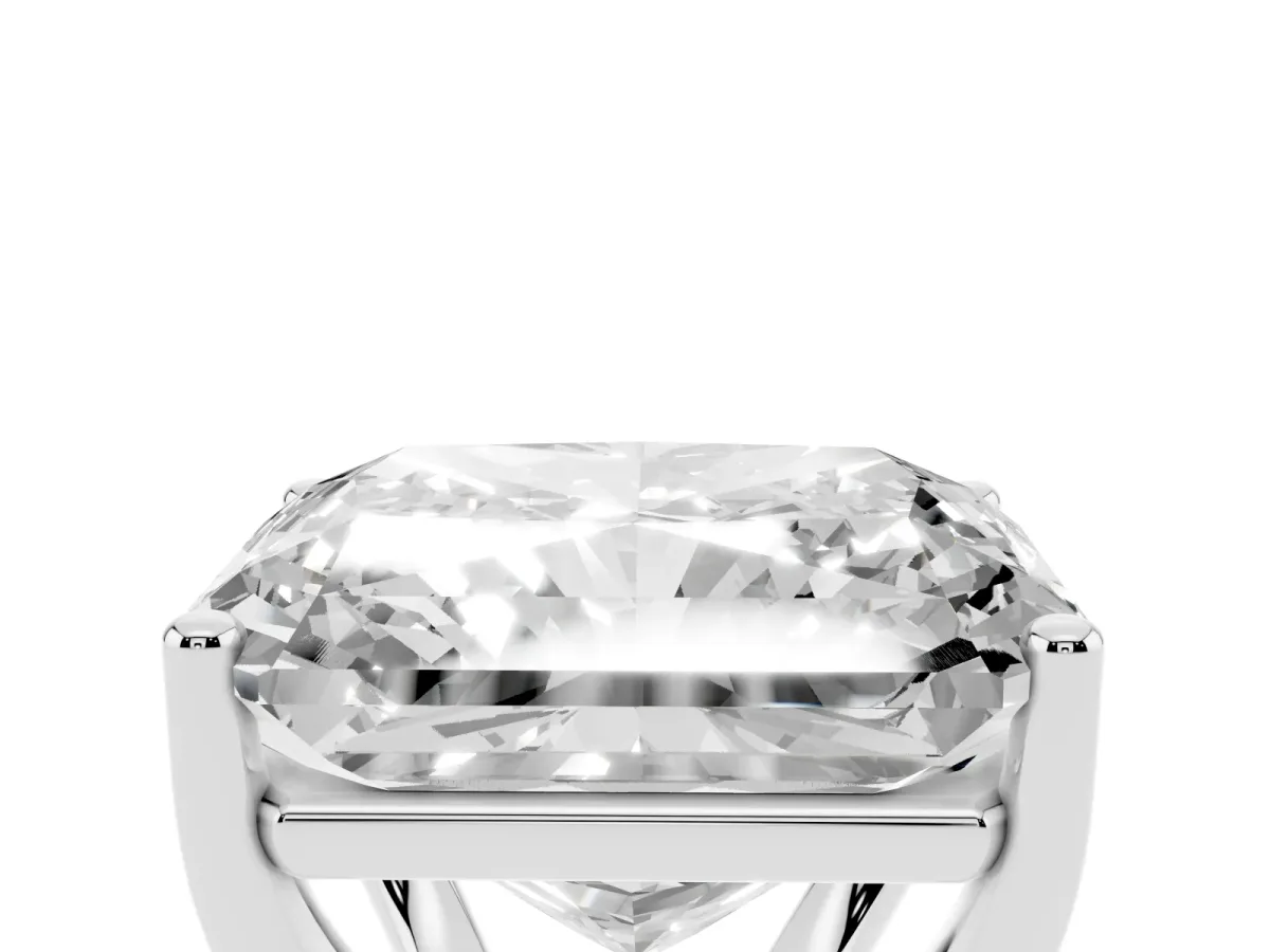 Radiant Cut Cut Diamond Solitaire Engagement Ring with Tapered Plain Band and Four-Prong Setting Silver