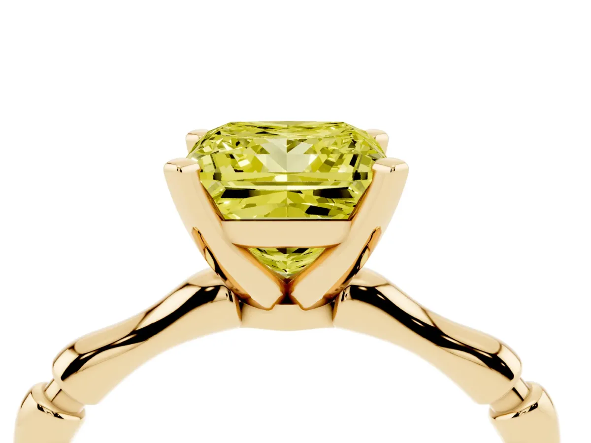 Fancy Yellow Princess Cut Solitaire Diamond Ring with Bamboo Band and Four-Prong Setting Yellow gold