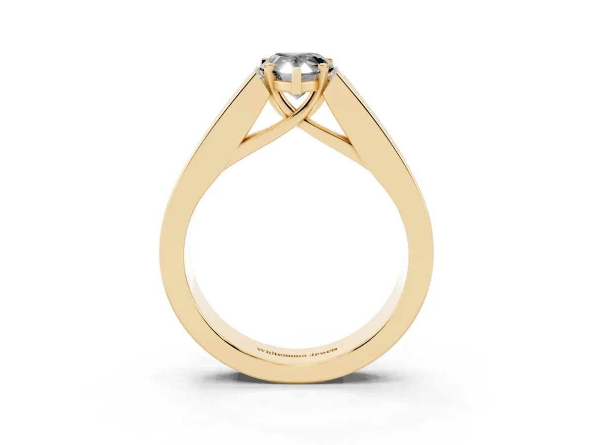 Fancy Black Pear Cut Cut Channel Set Solitaire Ring with Four-Prong Setting Yellow gold
