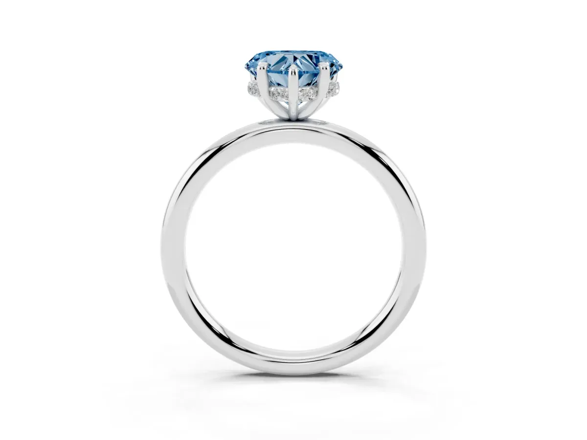 Fancy Blue Heart Cut Diamond Solitaire Ring with Thin Band and Four-Prong Setting Silver