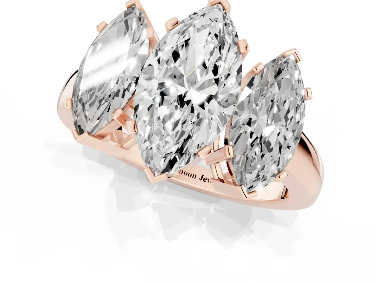 Three-Stone Marquise Cut Cut Diamond Ring with Channel Set Band and Four-Prong Setting Rose gold