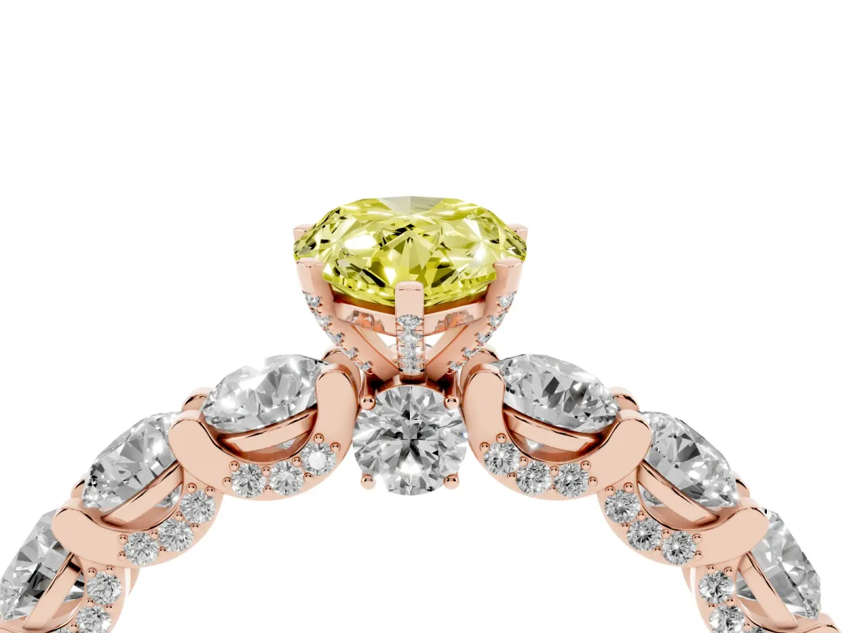 Fancy Yellow Pear Cut Diamond Side Stone Engagement Ring with Four-Prong Setting Rose gold