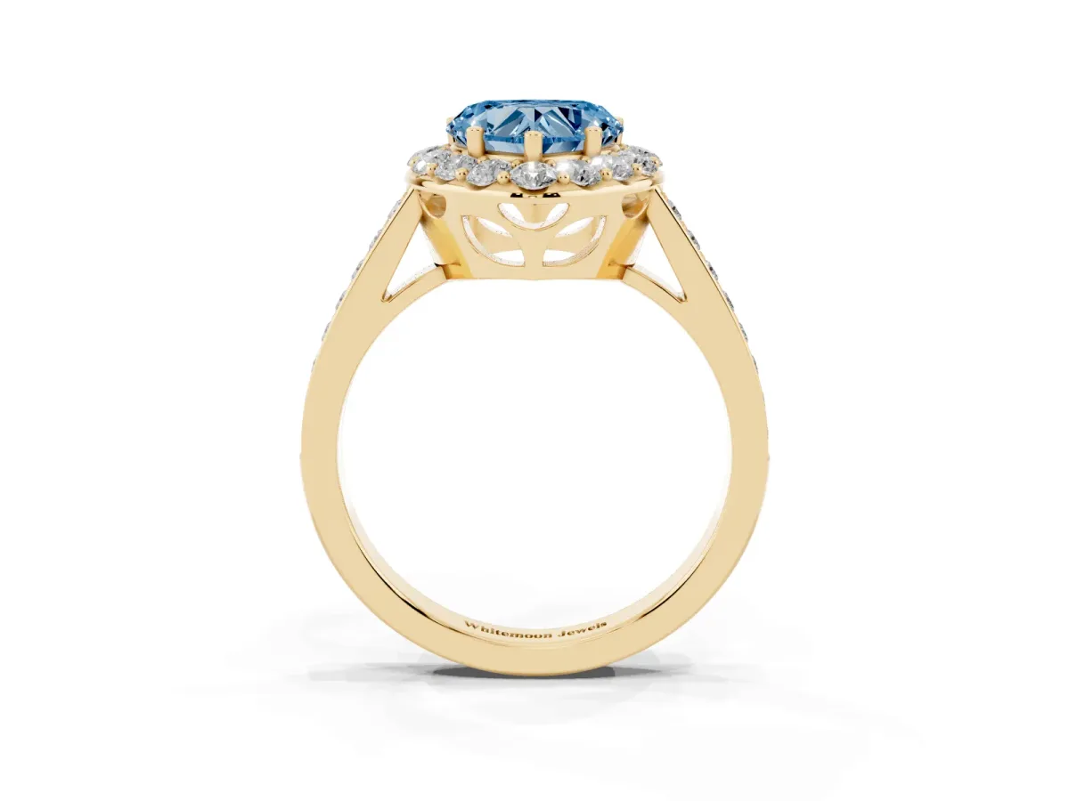 Fancy Blue Heart Cut Diamond Floral Halo Ring with Pavé Band and Prong Setting Yellow gold