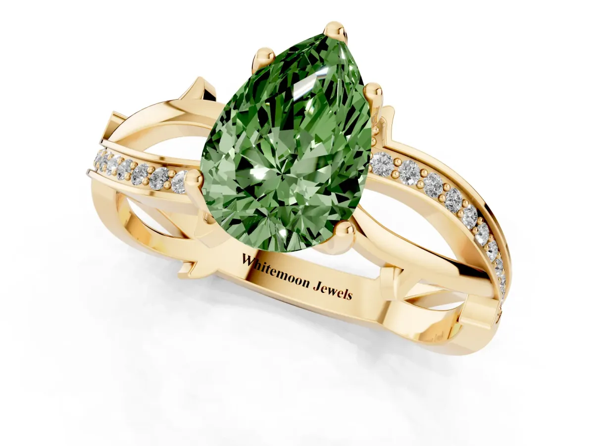 Fancy Green Pear Cut Solitaire Twist Band with Pavé Accents and Four-Prong Setting Yellow gold