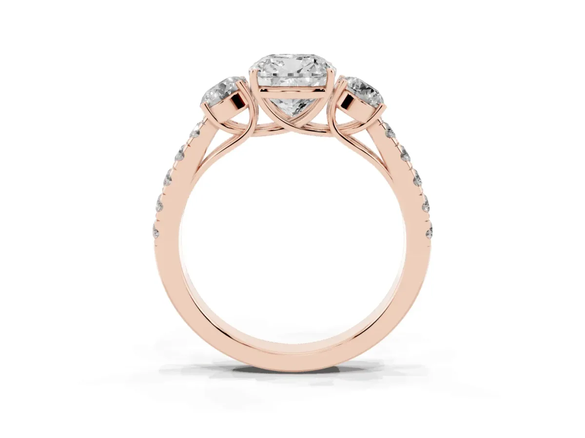 Cushion Cut Cut Diamond Three-Stone Ring with Round Side Stones and Pavé Band Rose gold