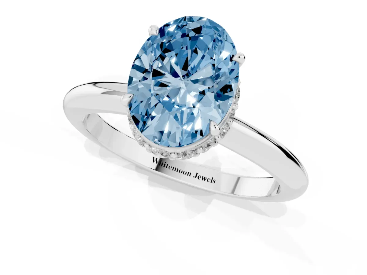 Fancy Blue Oval Cut Brilliant Solitaire Engagement Ring with Six-Prong Setting and Classic Band White gold