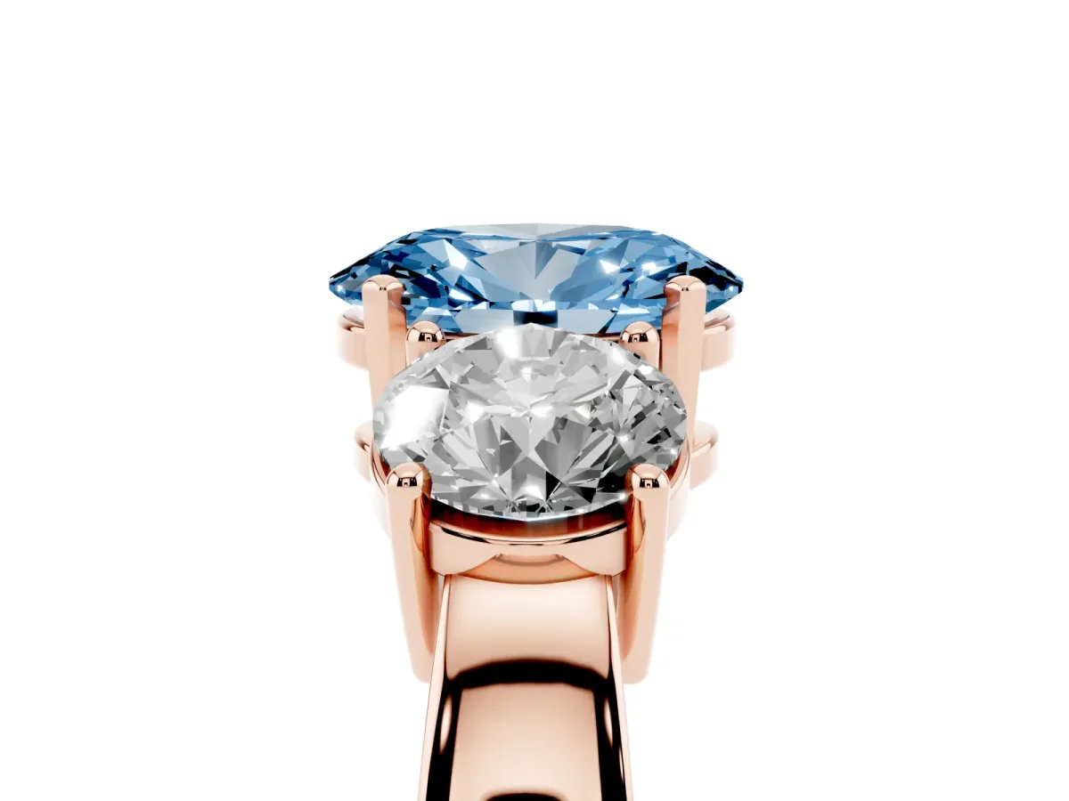 Fancy Blue Three-Stone Oval Cut Diamond Ring with Round Side Stones, Classic Band, and Four-Prong Setting Rose gold