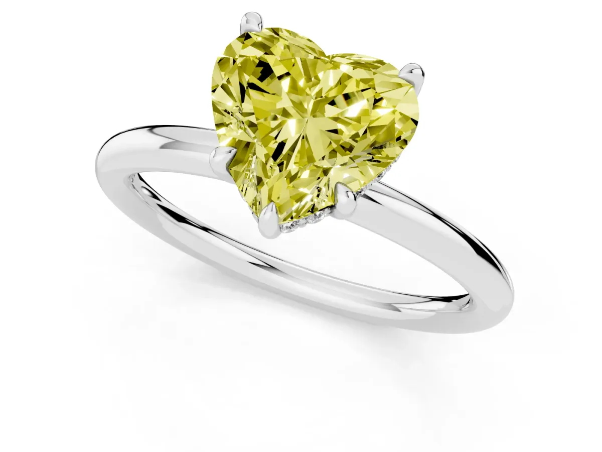 Fancy Yellow Heart Cut Diamond Solitaire Ring with Thin Band and Four-Prong Setting Silver