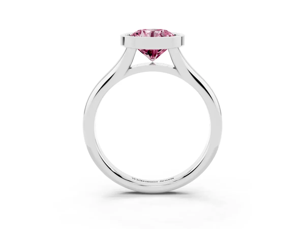 Fancy Pink Bezel Set Round Cut Solitaire Diamond Ring with Smooth Band Silver