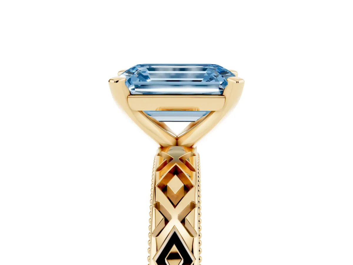 Fancy Blue Emerald Cut Solitaire Diamond Ring with Milgrain and Black Enamel X Pattern Band Yellow gold