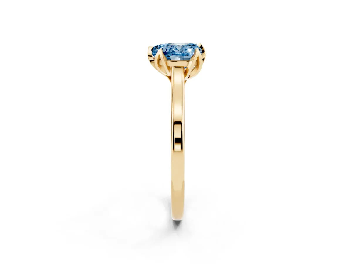 Fancy Blue Heart Cut Diamond Solitaire Ring with Flower Prong Setting and Classic Band Yellow gold
