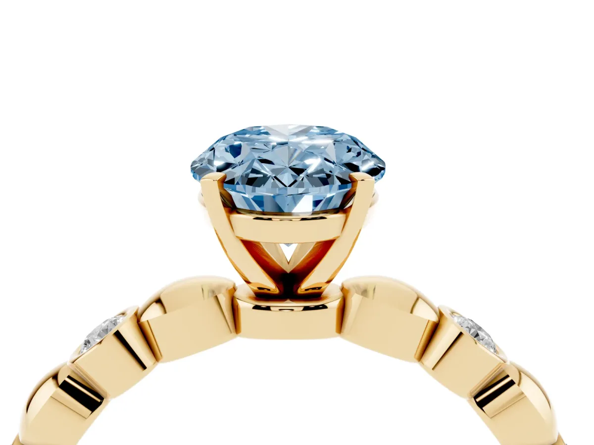 Fancy Blue Oval Cut Solitaire Bezel-Set Diamond Ring with Beaded Band and Four-Prong Setting Yellow gold