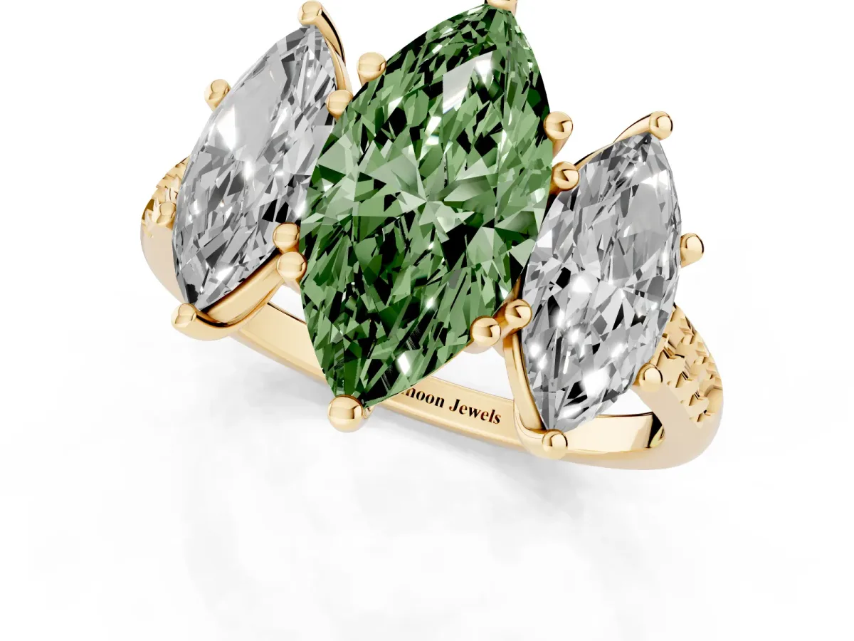 Fancy Green Three-Stone Marquise Cut Diamond Ring with Round Pavé Band and Prong Setting Yellow gold