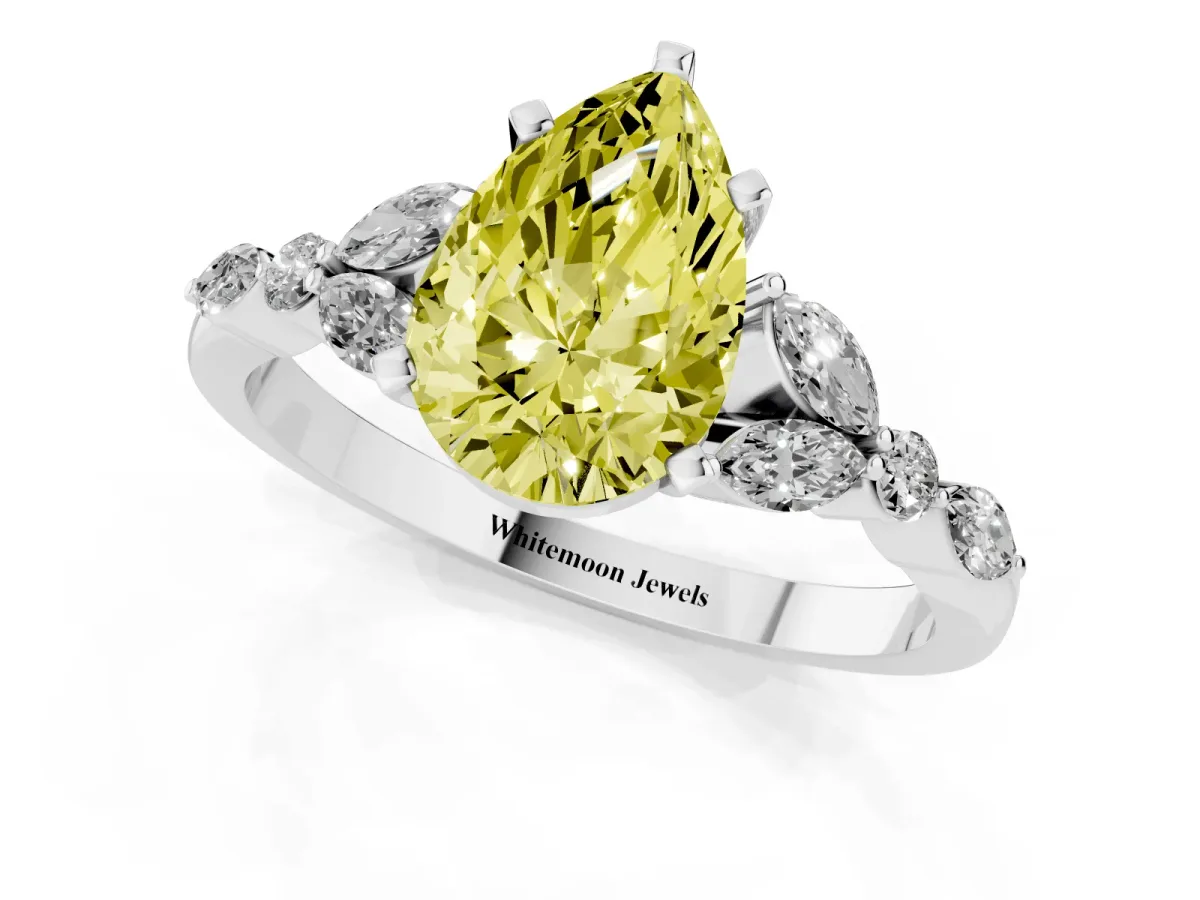 Fancy Yellow Pear Cut Diamond Solitaire Ring with Side Stones and Four-Prong Setting Platinum