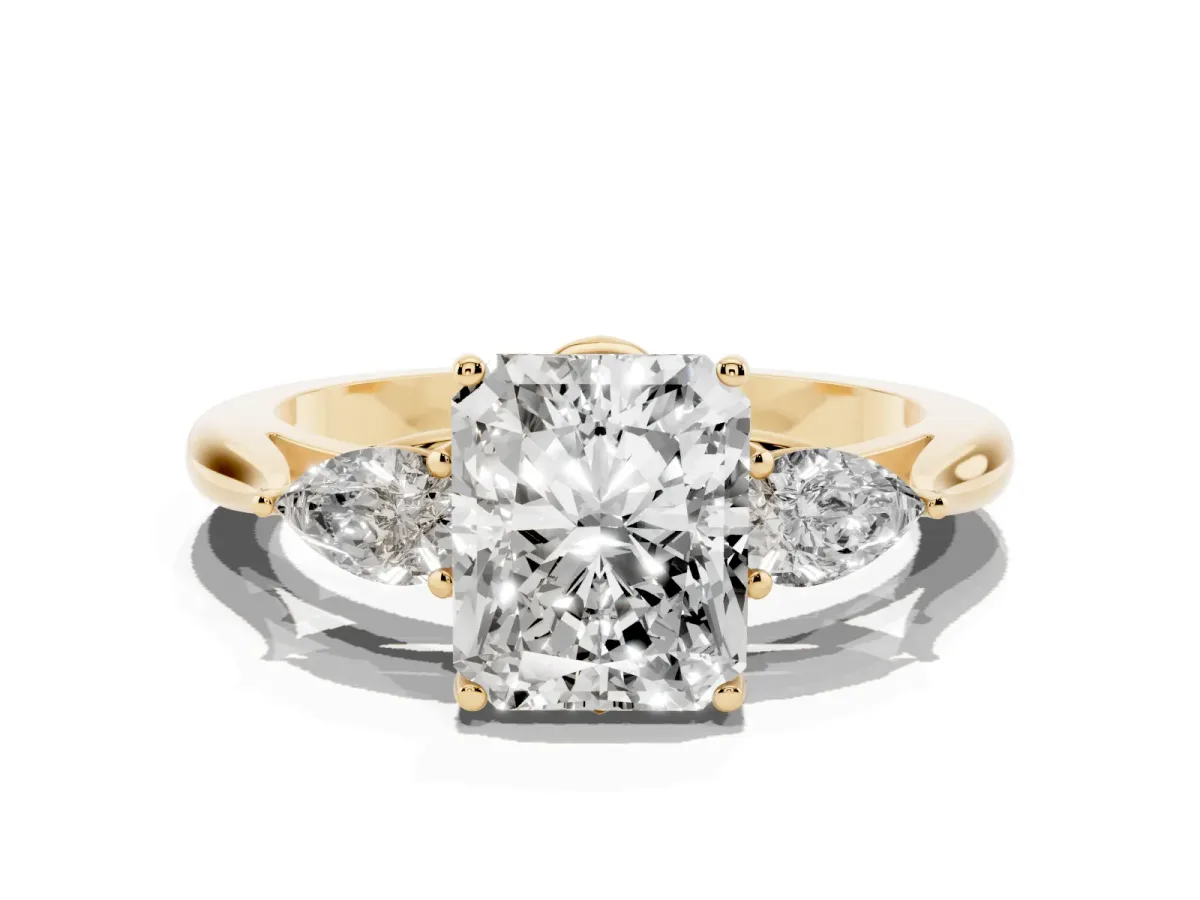 Three-Stone Radiant Cut Brilliant Diamond Solitaire Ring with Tapered Band and Four-Prong Setting Yellow gold