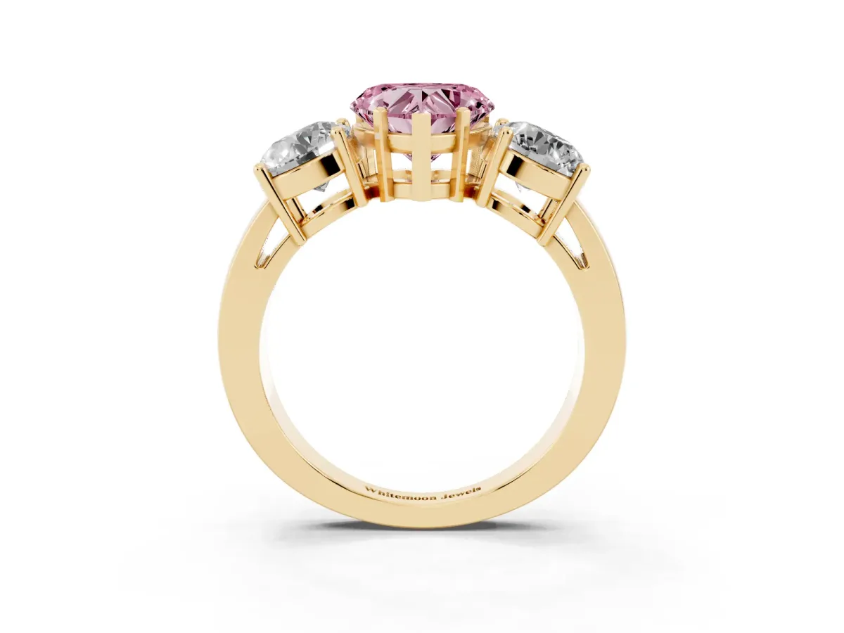 Fancy Pink Three-Stone Heart Cut Diamond Ring with Round Side Stones, Classic Band, and Four-Prong Setting Yellow gold