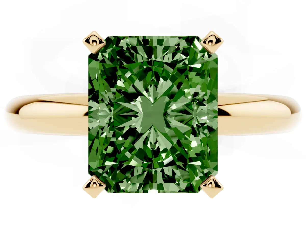 Fancy Green Radiant Cut Diamond Solitaire Engagement Ring with Round Band and Four-Prong Setting Yellow gold