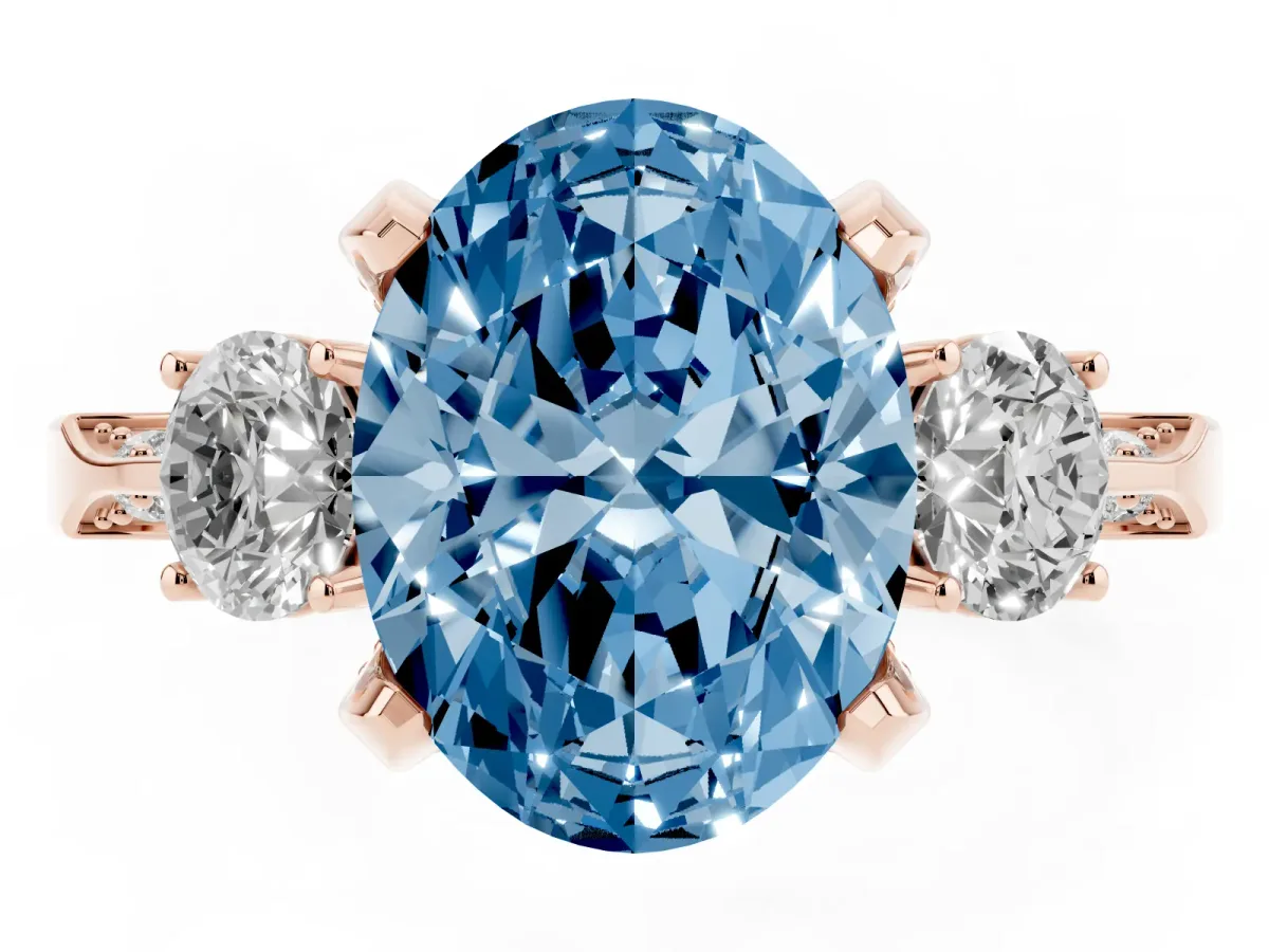 Fancy Blue Oval Cut Brilliant Three-Stone Diamond Ring with Pavé Band and Four-Prong Setting Rose gold